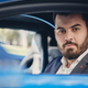 A photo of Bugatti CEO Mate Rimac sitting in a Chiron.